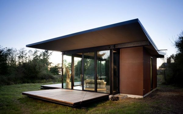 Wood Cabin with Folding Walls in San Juan, Washington by Olson Kundig Architects